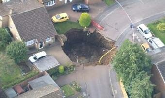 Repair of Sink Hole Opened in a Street in St Albans has so Far Cost £100,000 